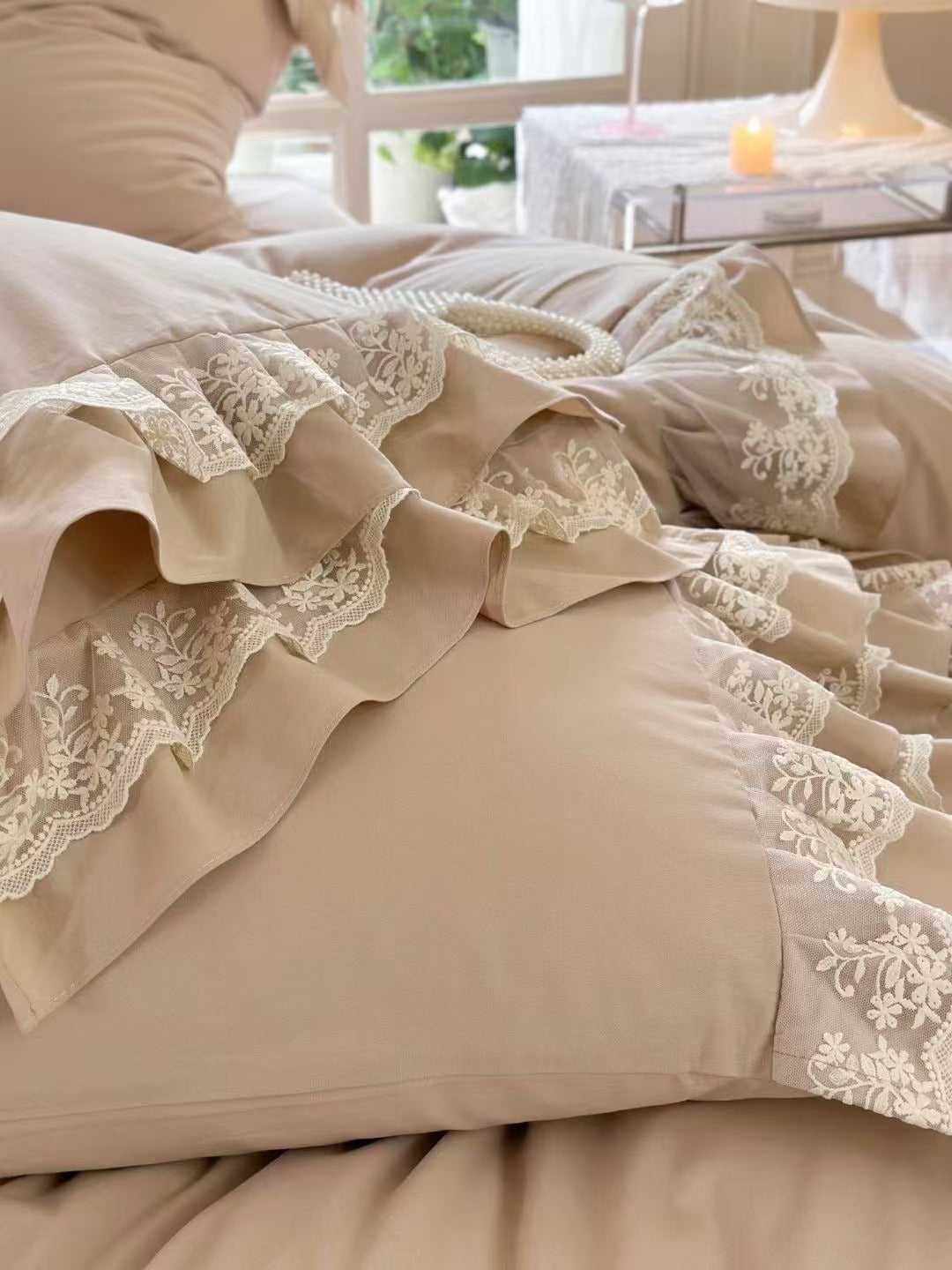 Luxurious pink lace bedding set, designed with intricate details and ultra-soft fabric for an elegant and romantic bedroom retreat.