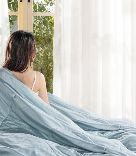 Queen-sized summer quilt made of Tencel, offering breathable comfort and a cool, refreshing feel for warm nights.