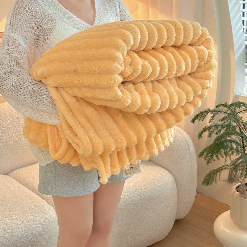 The best blanket for winter in a soft butter color, designed for ultimate warmth and comfort, perfect for chilly nights.