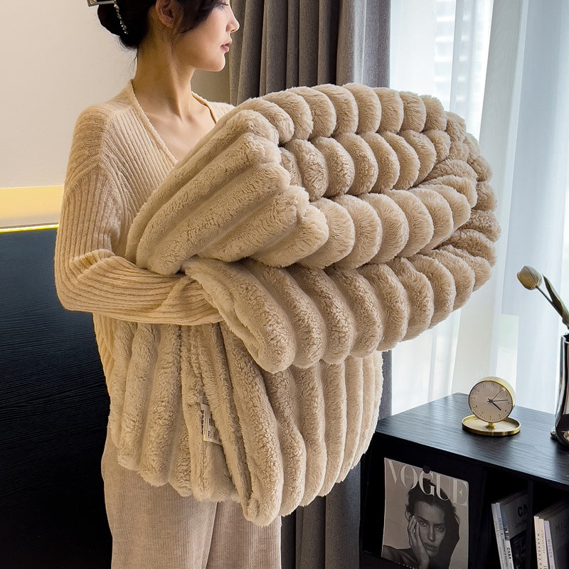 Best blankets for winter in khaki, made with plush rabbit faux fur, offering ultimate warmth and luxurious comfort for cold weather.