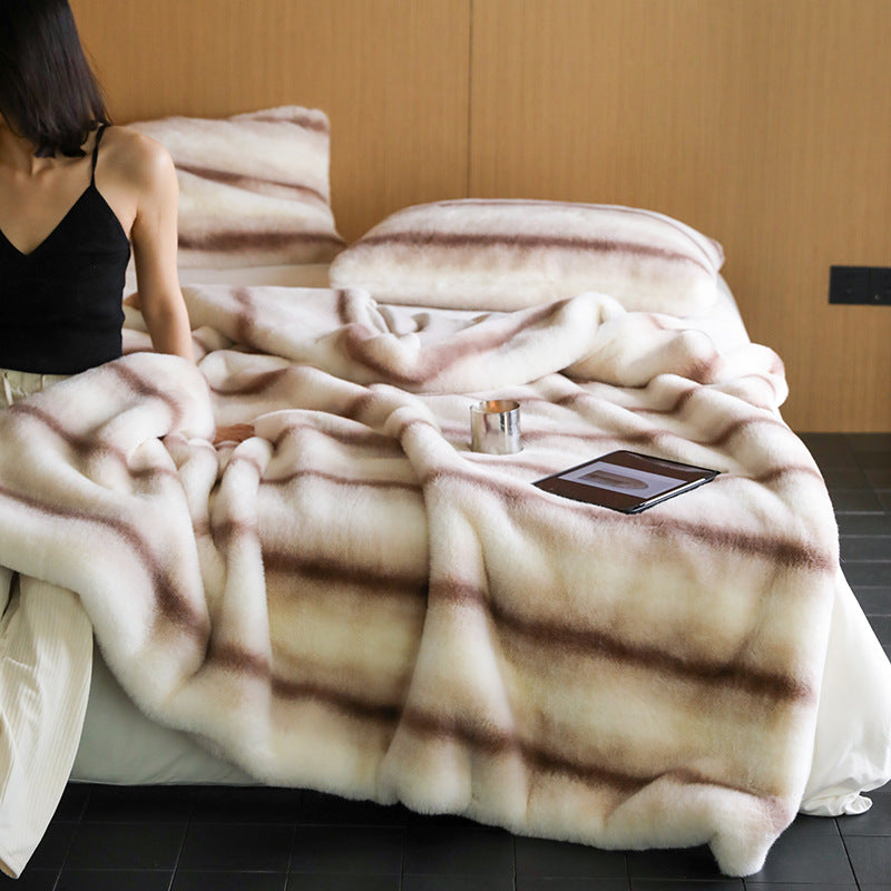 Luxuriously soft white faux mink blanket, designed for ultimate warmth and comfort. Thick and cozy, making it the perfect winter essential for keeping warm on cold nights.
