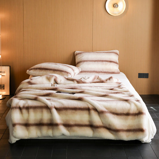Cozy faux mink throw blanket with a velvety soft texture, perfect for lounging on the couch or adding a touch of luxury to your decor. Thick and warm, ideal for chilly evenings.